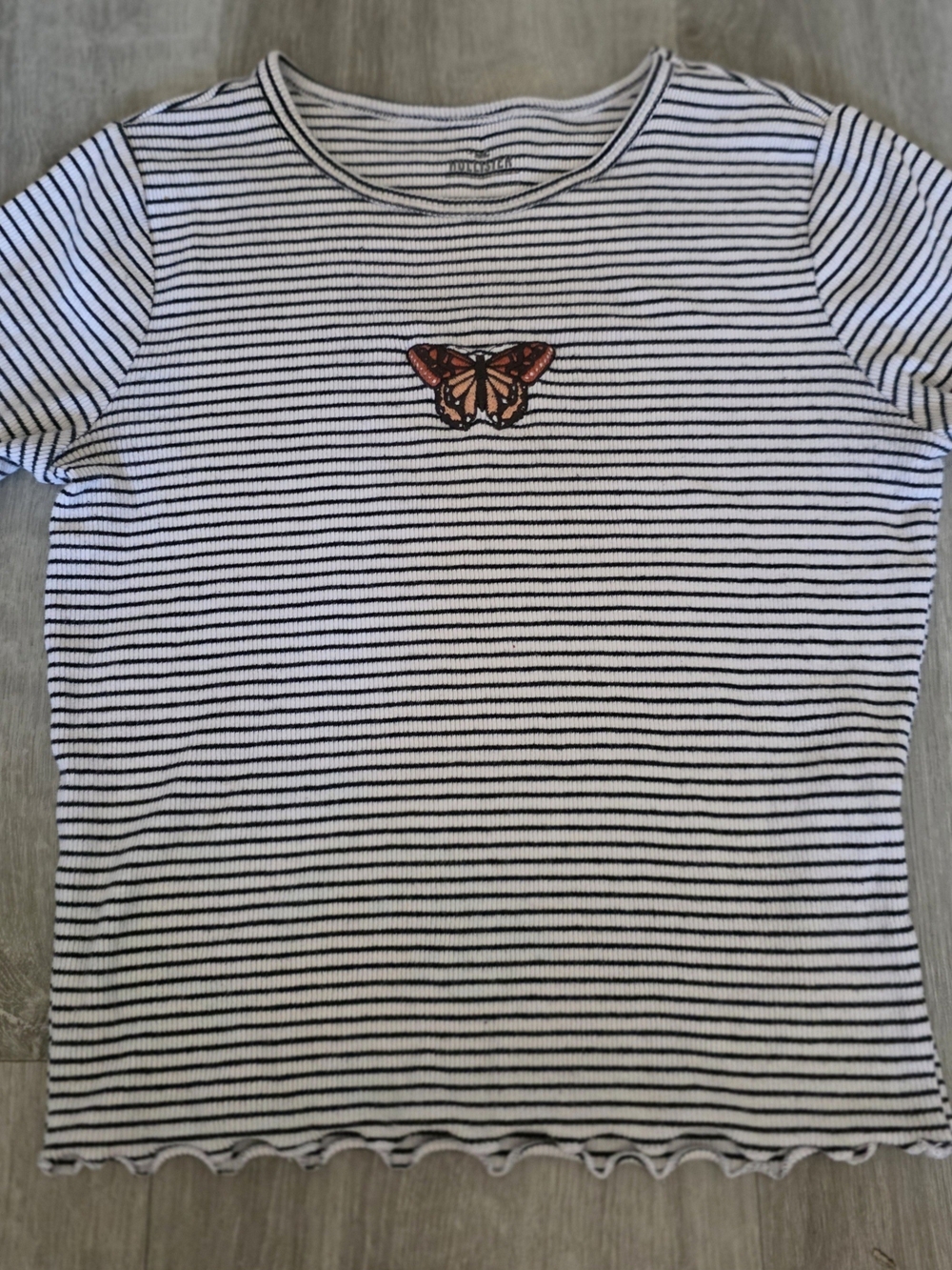 Hollister Black & White Striped Tee with Orange Butterfly Patch